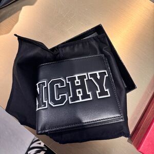 Authentic, brand new Givenchy wallet in black.